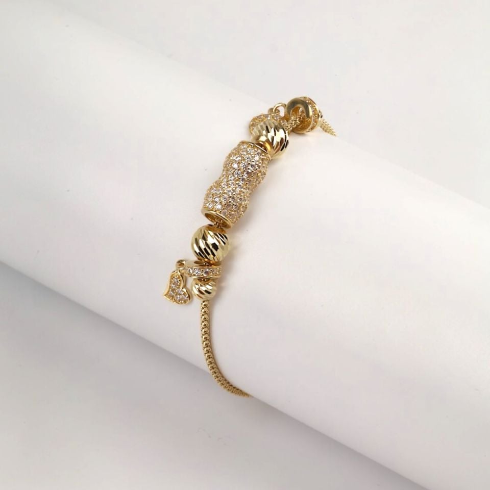 14 Carat Gold Stone Horseshoe and Heart Figured Charm Bracelet