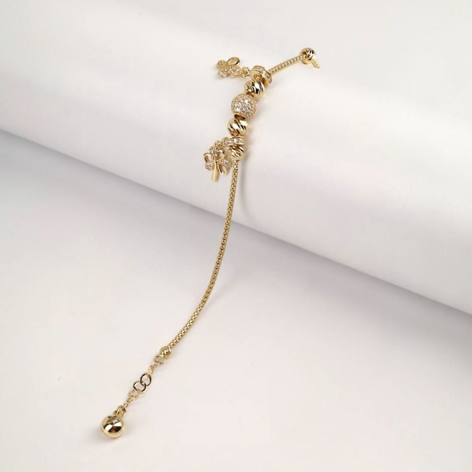 14K Gold Butterfly and Flower Figured Charm Bracelet